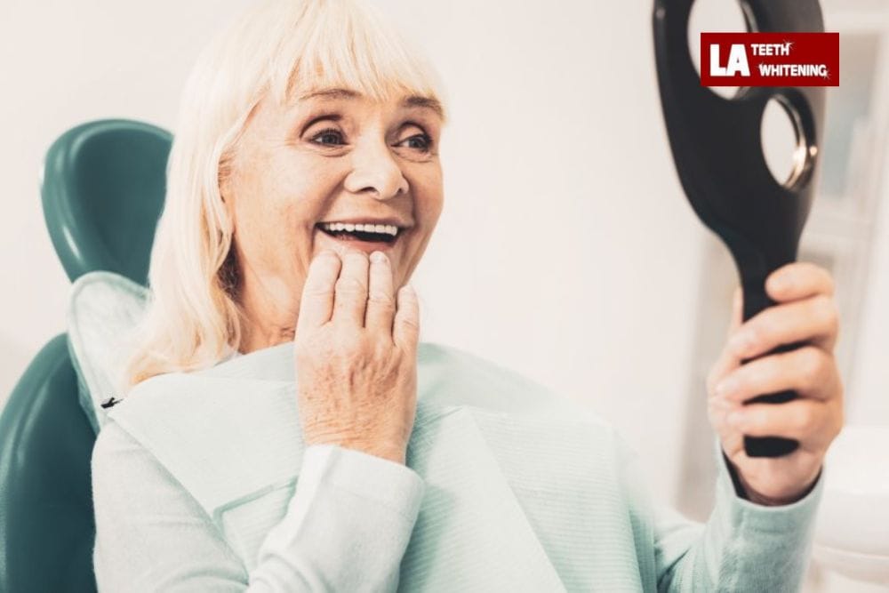 older person smiling, showing natural yellowing of teeth due to aging Wolverhampton